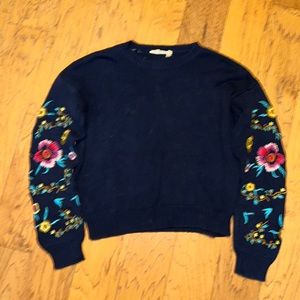 Navy boutique sweater with embroidery on sleeves. Womens small